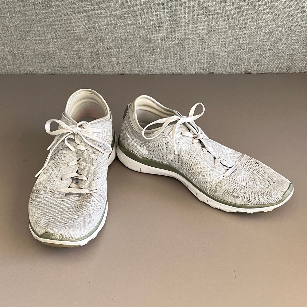 Green & silver Nike tennis shoes